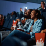 couple watching a movie in cinema