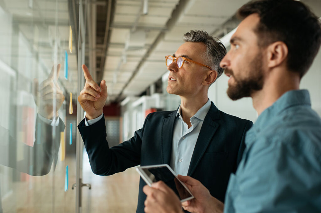 Business people meeting planning start up, talking, discussing ideas, brainstorming