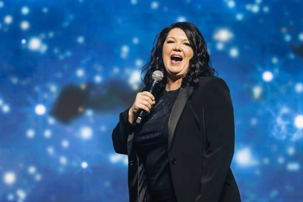 Jessica Nieto speaking on-stage at eXpCON