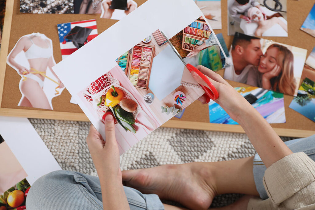 Woman creating a vision board