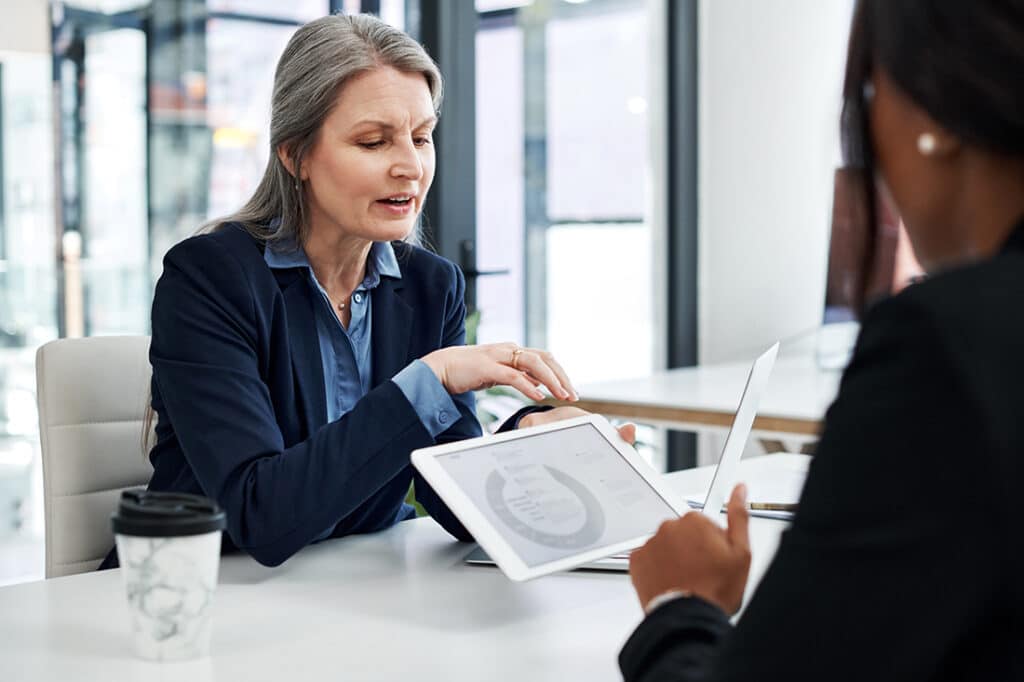 A financial planner meets with a client to discuss their financial goals